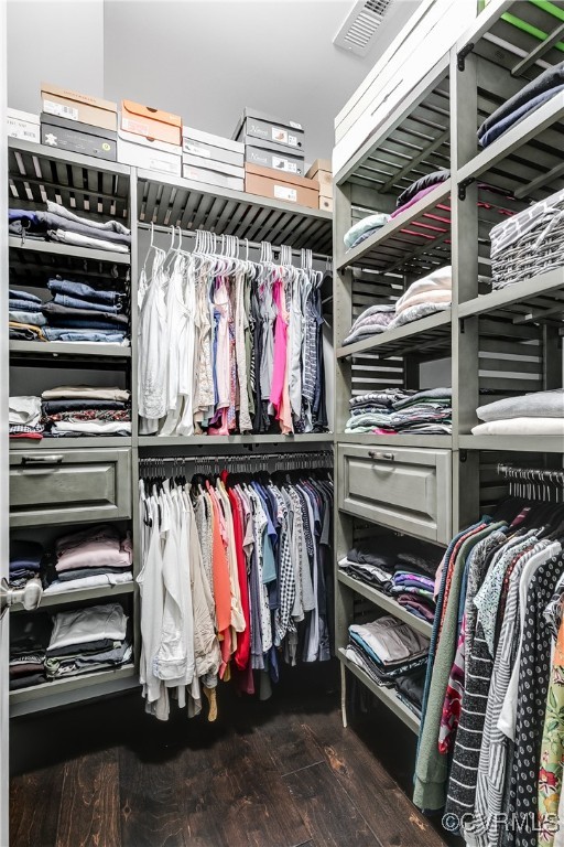 16506 Binley Road Midlothian, VA 23112 - Photo 33 of 49 a view of walk in closet with clothes and shoes