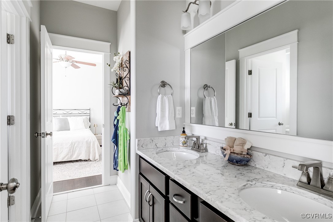 16506 Binley Road Midlothian, VA 23112 - Photo 37 of 49 a en suite bathroom with a granite countertop sink and a mirror