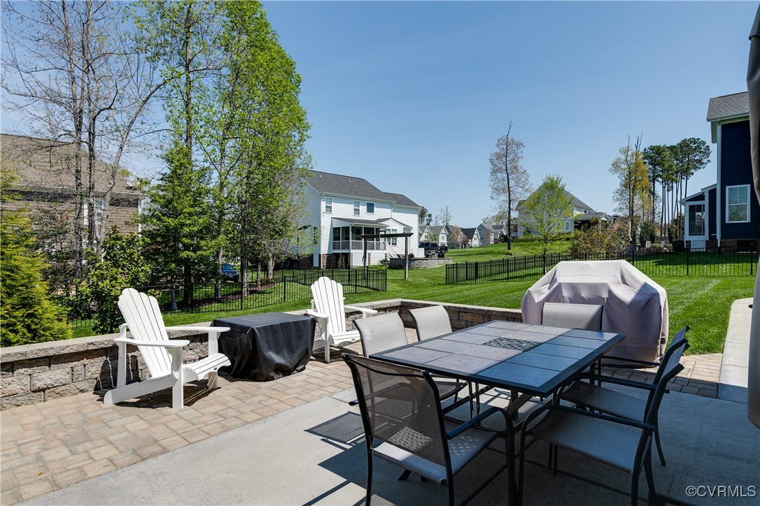 16506 Binley Road Midlothian, VA 23112 - Photo 47 of 49 a view of a chairs and table in backyard of the house