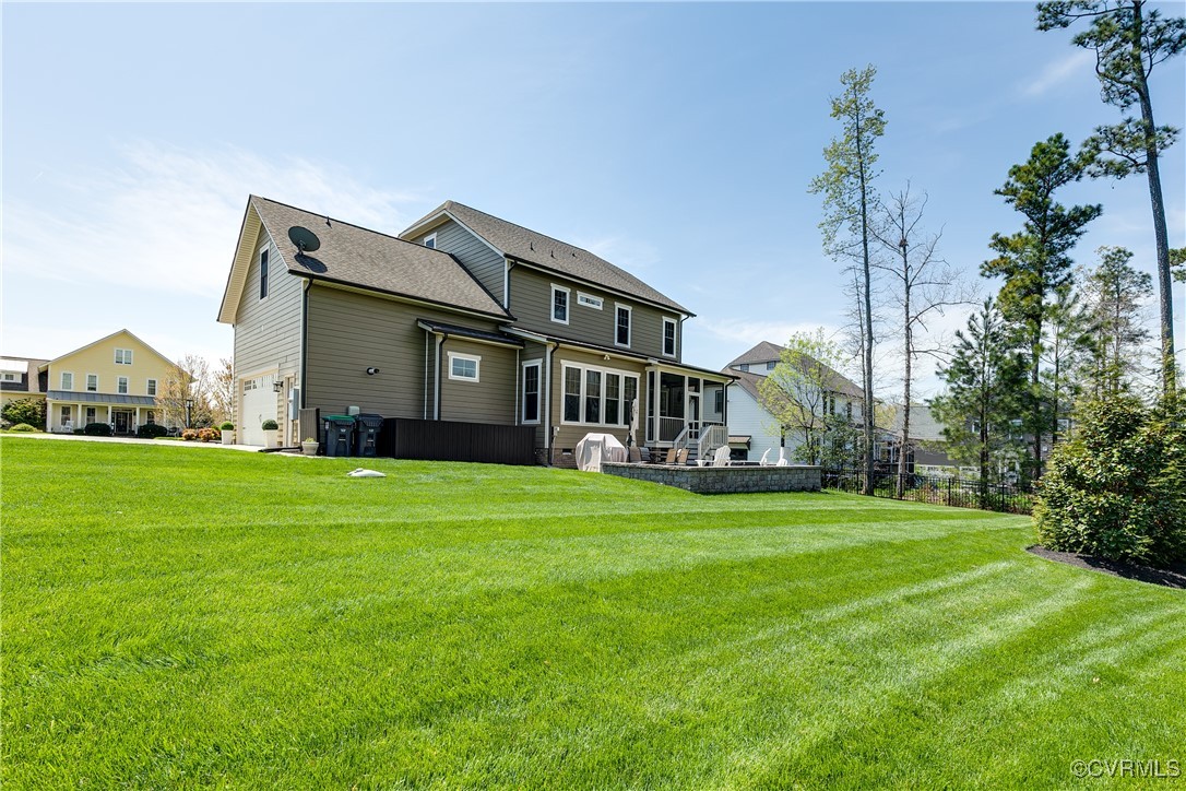 16506 Binley Road Midlothian, VA 23112 - Photo 48 of 49 a front view of house with yard and green space