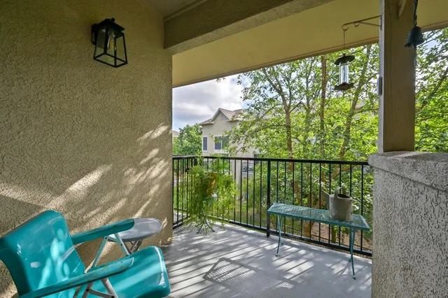 a view of a two chair in the balcony