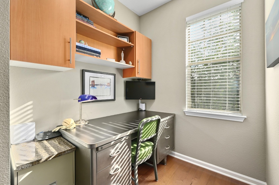 11203 Ranch Road 2222, Unit 1104 Austin, TX 78730 - Photo 19 of 24 a view of a workspace with furniture and a window