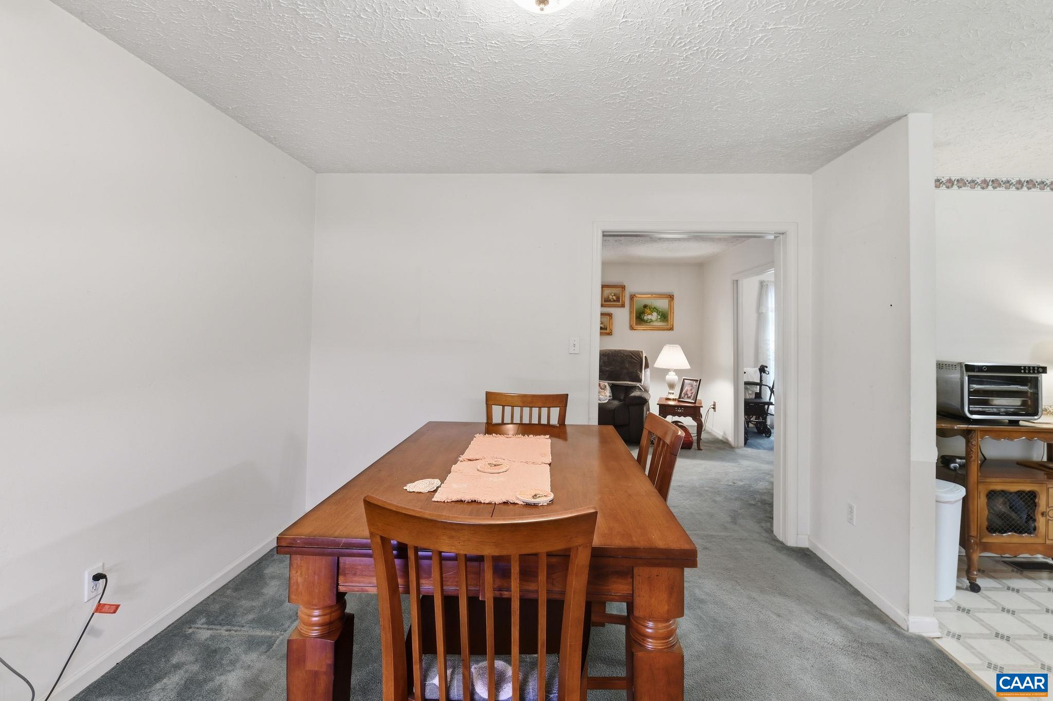 16070 Burnley Road Barboursville, VA 22923 - Photo 11 of 37 a view of a dining room with furniture