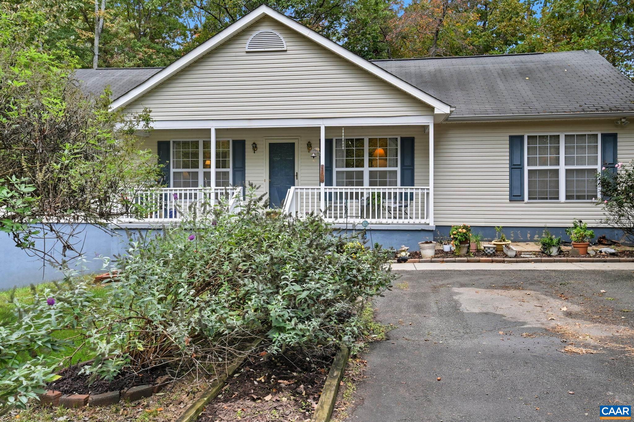 16070 Burnley Road Barboursville, VA 22923 - Photo 2 of 37 a front view of a house with yard and green space