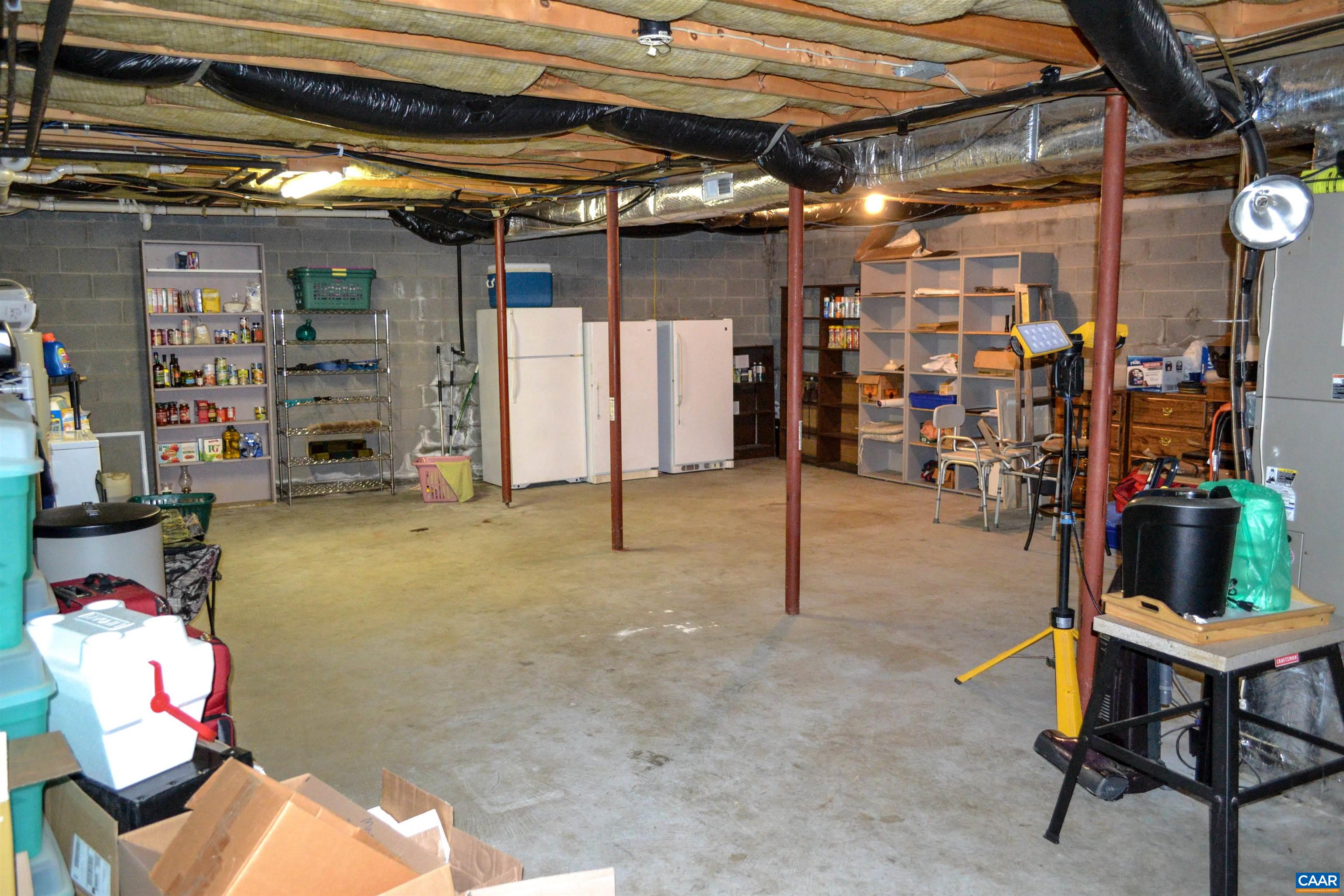 16070 Burnley Road Barboursville, VA 22923 - Photo 23 of 37 a view of store room with gym equipment