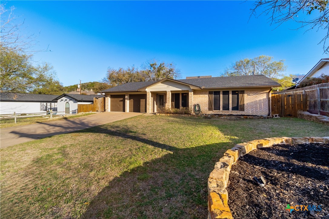 2204 Moon Valley Road Harker Heights, TX 76548 - Photo 1 of 1 a view of a house with swimming pool and a yard