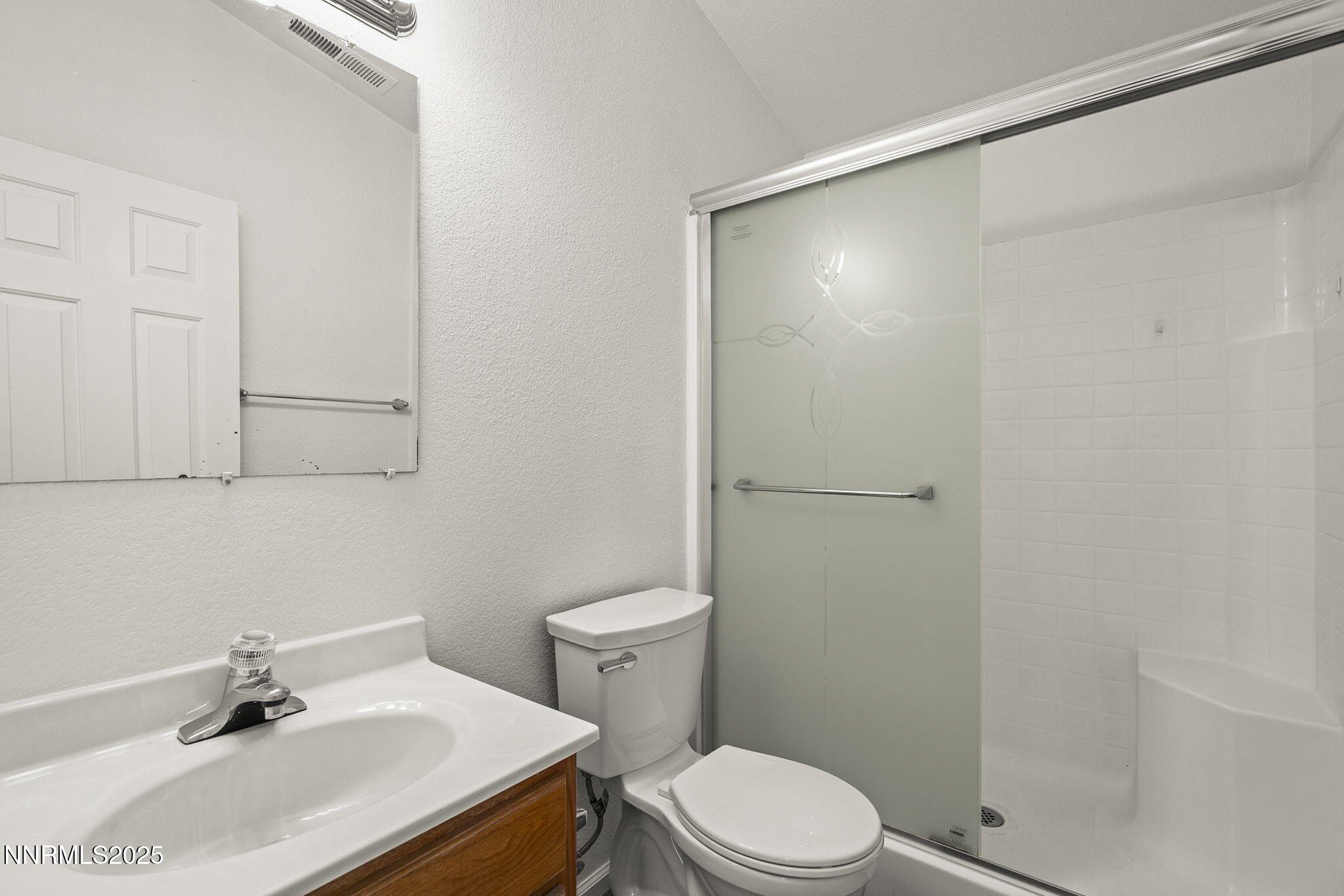 515 College Drive Reno, NV 89503 - Photo 16 of 25 a bathroom with a sink toilet and vanity