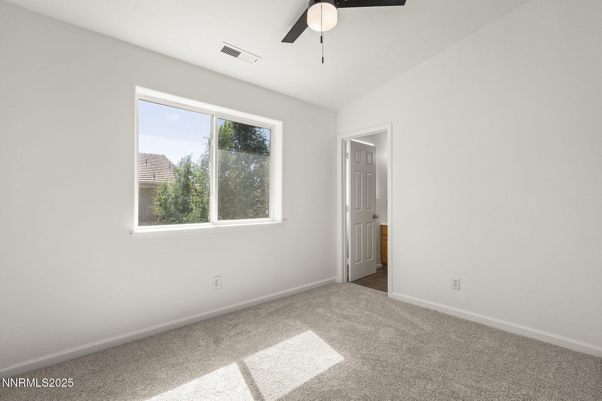 515 College Drive Reno, NV 89503 - Photo 17 of 25 a view of an empty room with a window