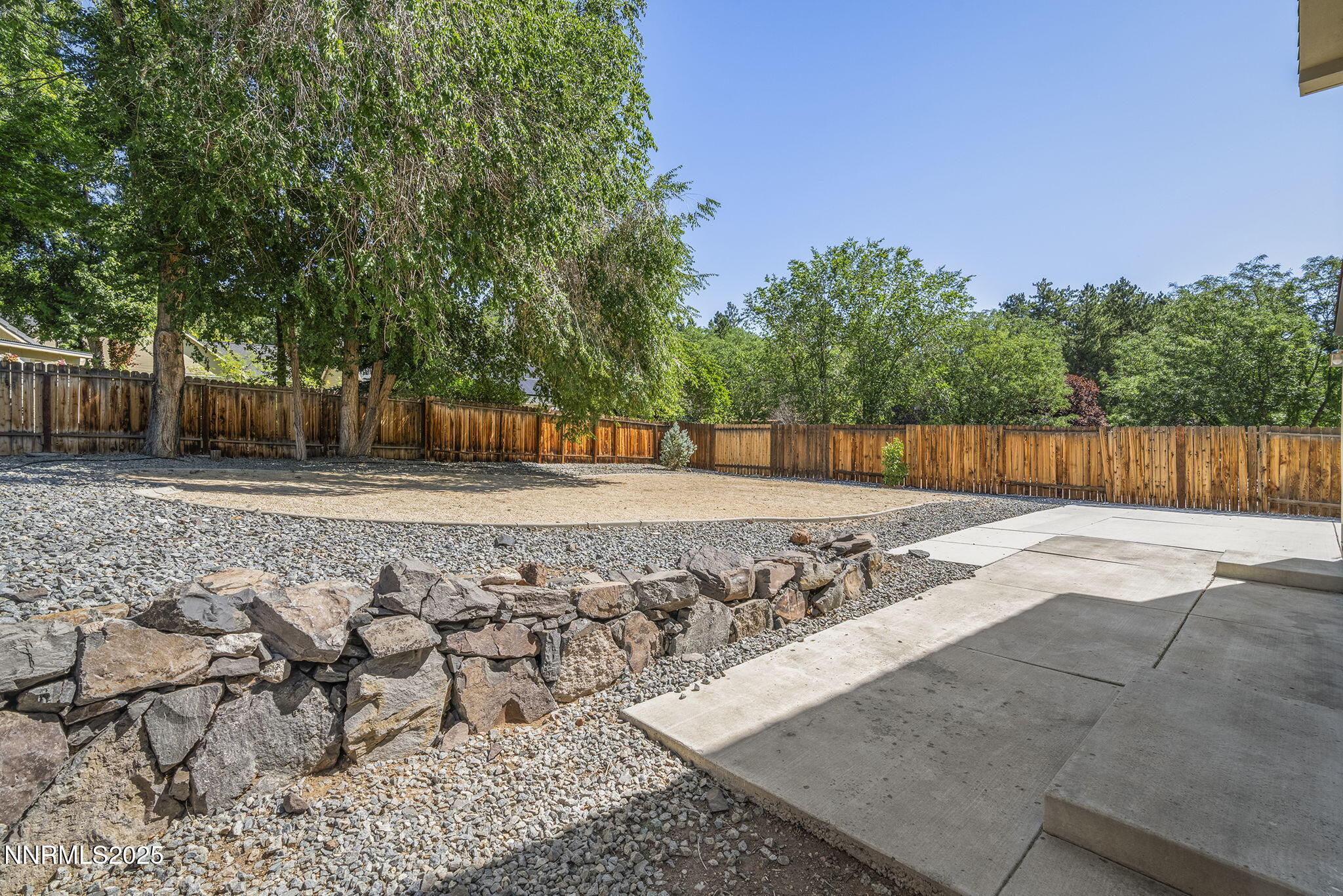 515 College Drive Reno, NV 89503 - Photo 19 of 25 a view of a backyard with trees