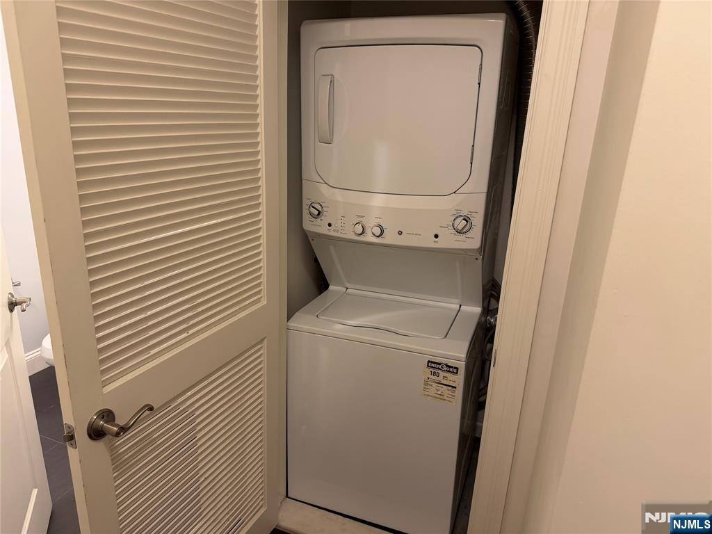 2001 Hudson Terrace, Unit 404 Fort Lee, NJ 07024 - Photo 16 of 21 a utility room with dryer and washer