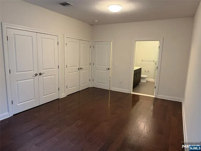 a view of a livingroom with wooden floor