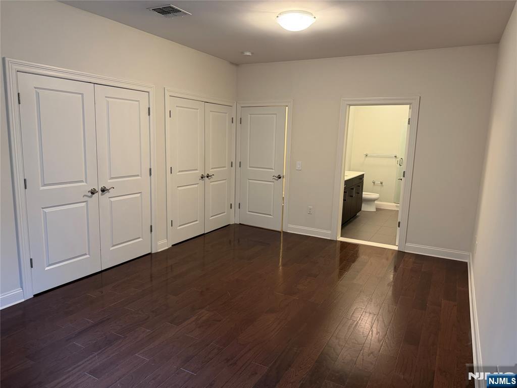2001 Hudson Terrace, Unit 404 Fort Lee, NJ 07024 - Photo 7 of 21 a view of a livingroom with wooden floor