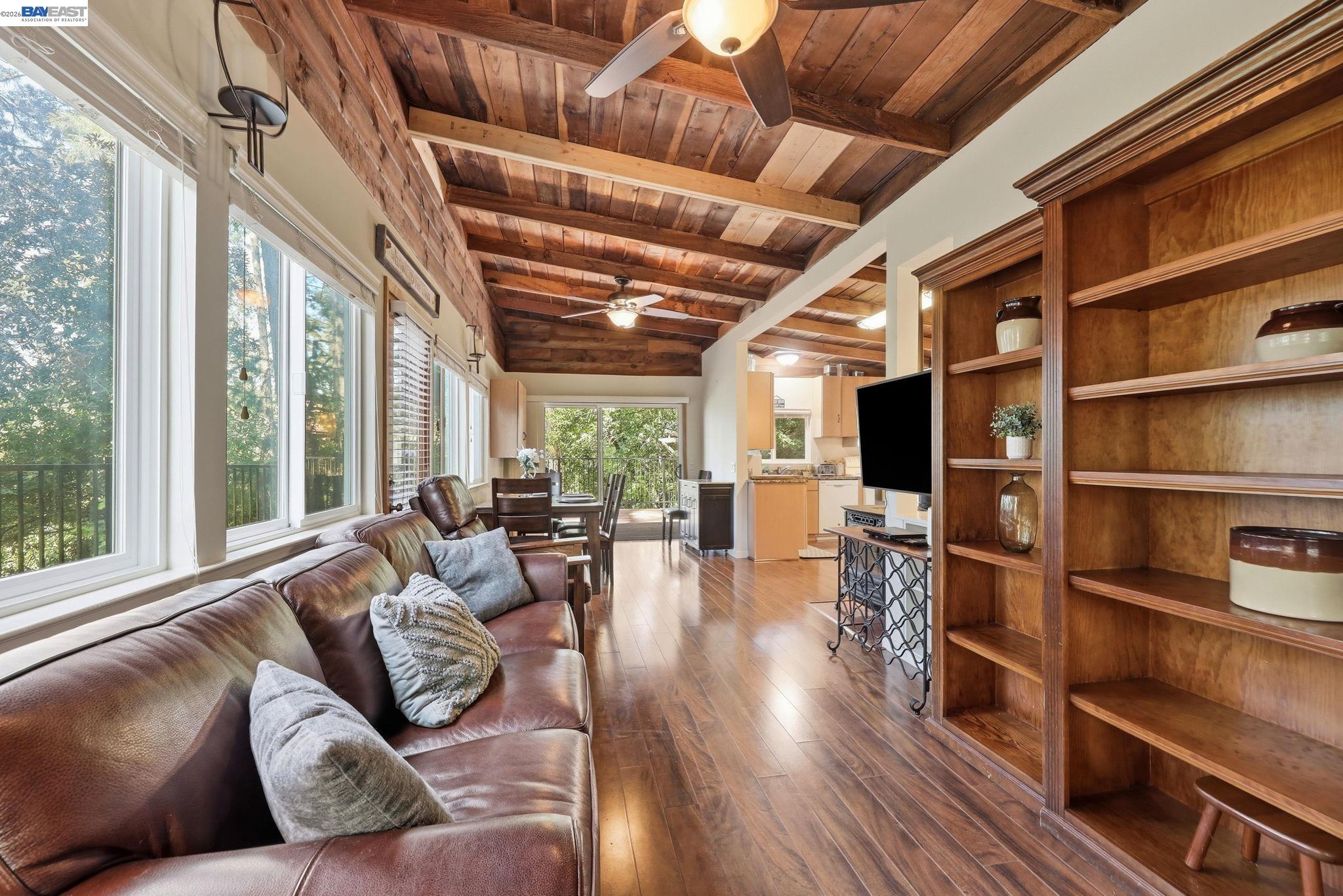 11700 Oak Road Forestville, CA 95436 - Photo 2 of 20 a living room with furniture wooden floor and a large window