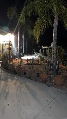 a couple of table and chairs in a patio