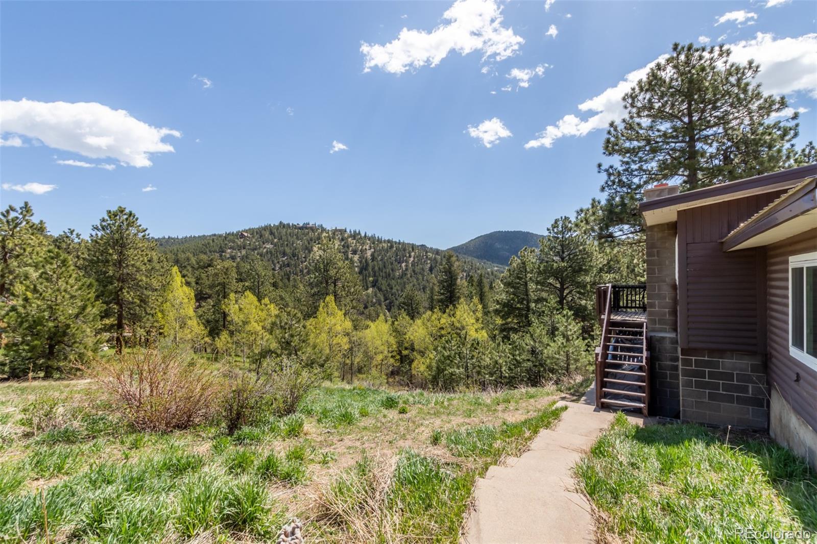 11388 Ranch Elsie Road Golden, CO 80403 - Photo 6 of 50 a view of a backyard