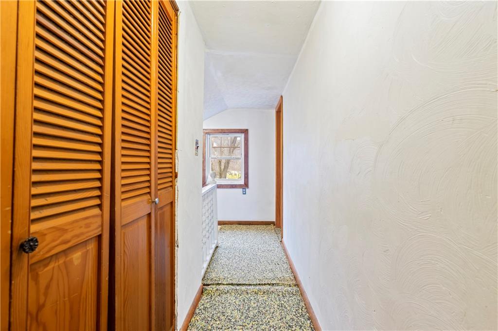 90 Dellenbaugh Road Tarentum, PA 15084 - Photo 17 of 25 a view of a hallway with a white walls