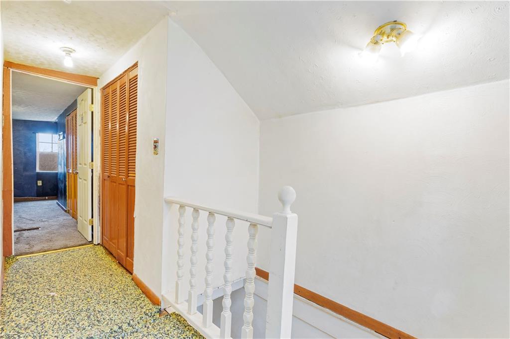 90 Dellenbaugh Road Tarentum, PA 15084 - Photo 18 of 25 a view of a hallway with wooden floor