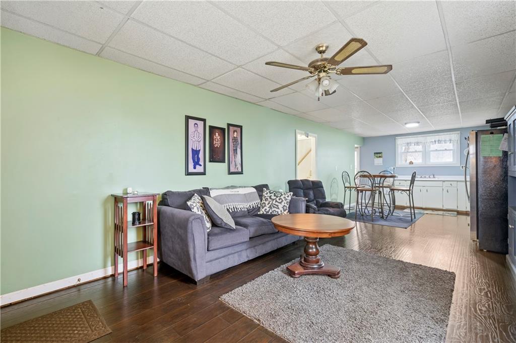 90 Dellenbaugh Road Tarentum, PA 15084 - Photo 6 of 25 a living room with furniture and a rug