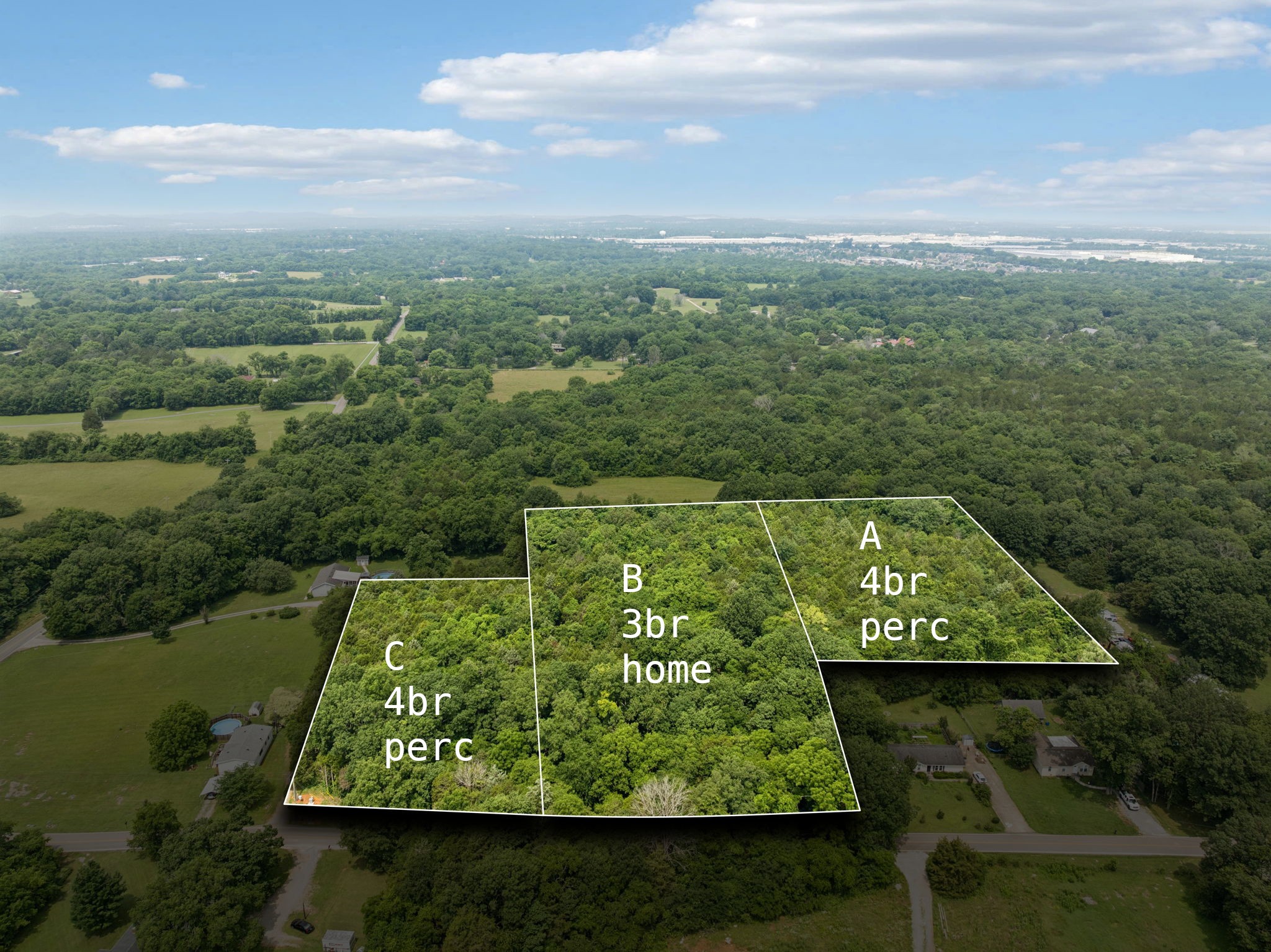 a view of a yard with a lake view