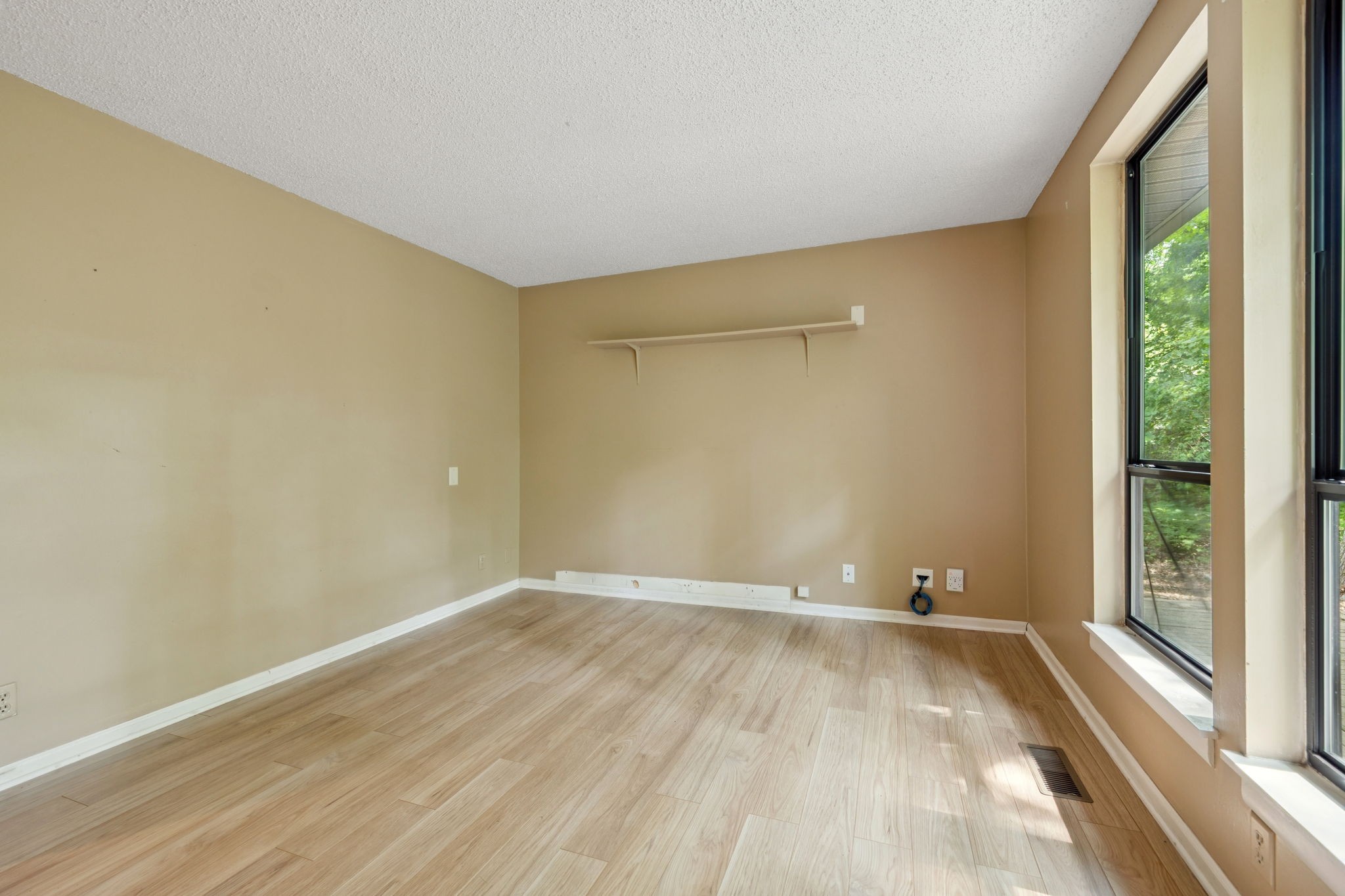 6031 Buckeye Valley Road Murfreesboro, TN 37129 - Photo 13 of 47 a view of room with window and hardwood floor