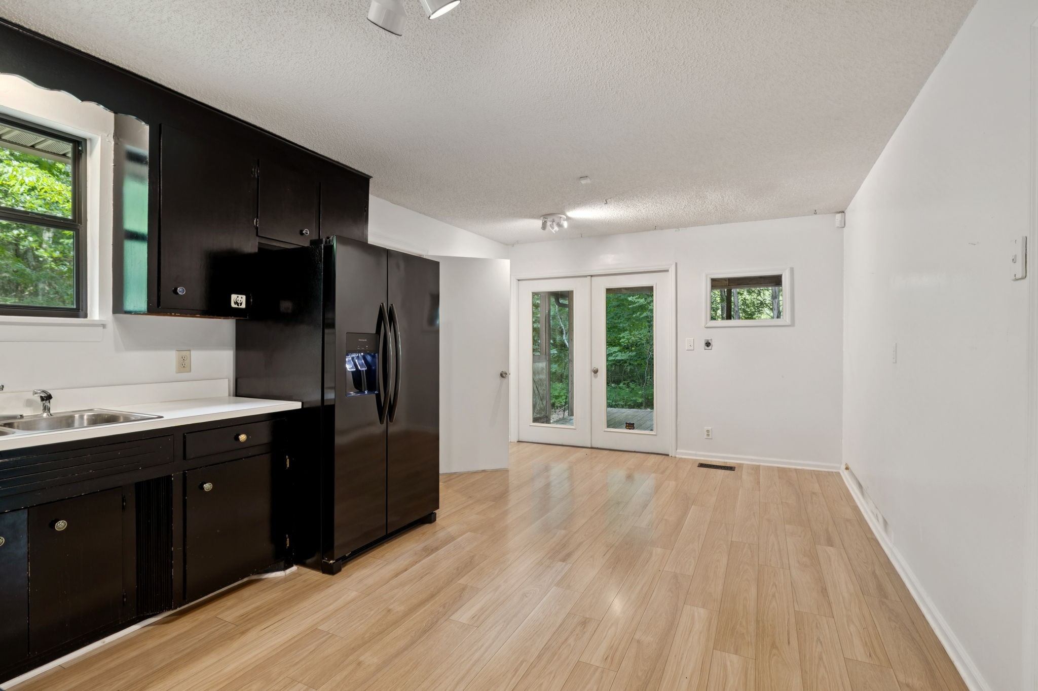 6031 Buckeye Valley Road Murfreesboro, TN 37129 - Photo 20 of 47 a kitchen with a refrigerator and window