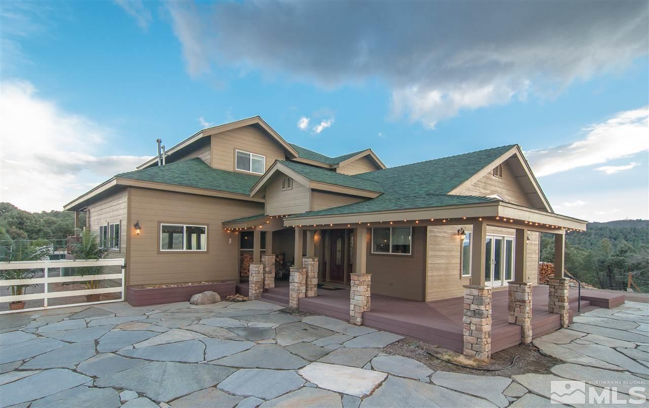 21285 Fey Road Reno, NV 89521 - Photo 1 of 1 a front view of a house with a porch