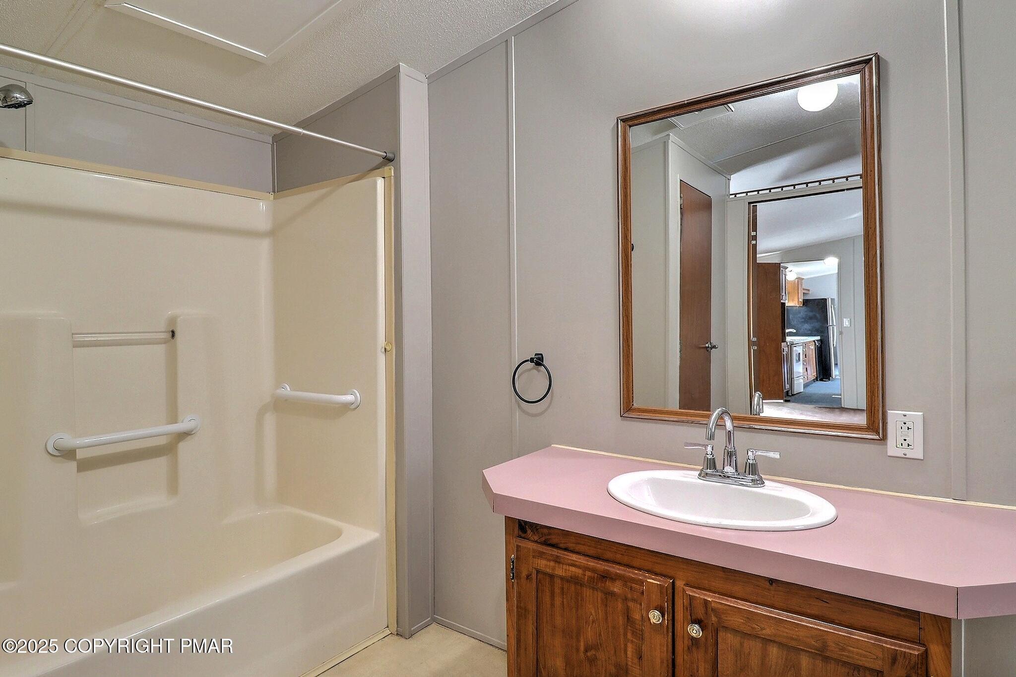 205 Oak Run Lane Stroudsburg, PA 18360 - Photo 18 of 29 a bathroom with a sink and a mirror