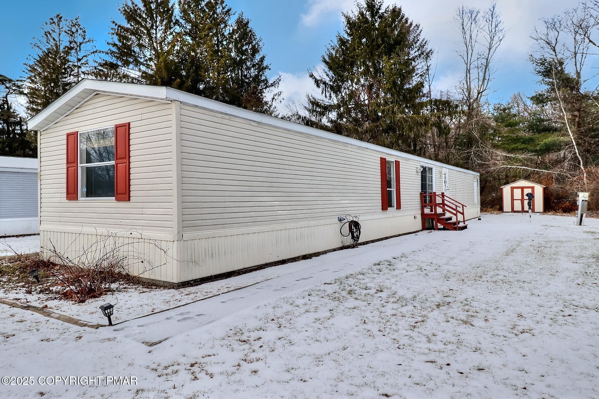205 Oak Run Lane Stroudsburg, PA 18360 - Photo 2 of 29 a view of a house with a yard
