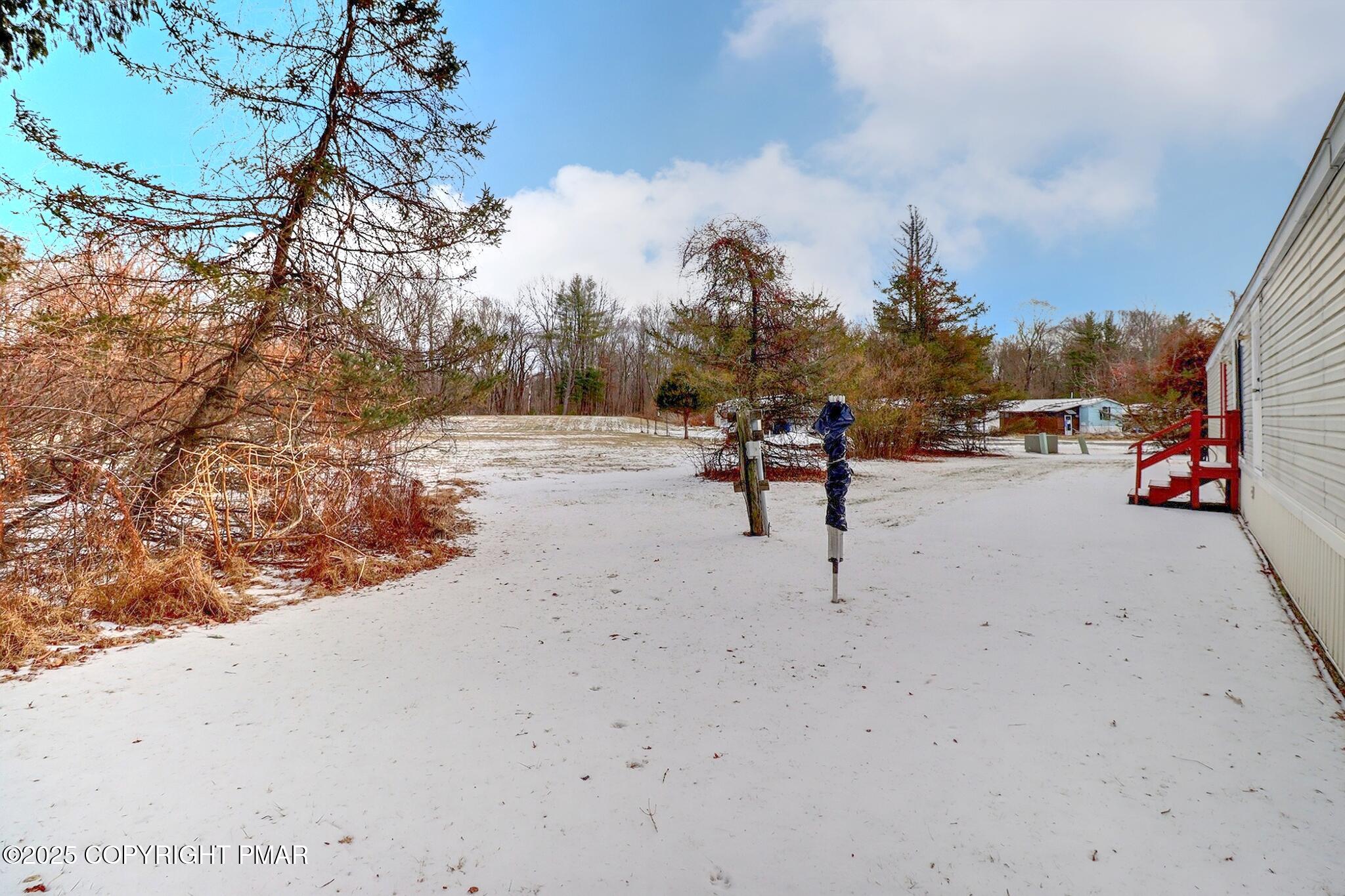 205 Oak Run Lane Stroudsburg, PA 18360 - Photo 28 of 29 a view of outdoor space with seating