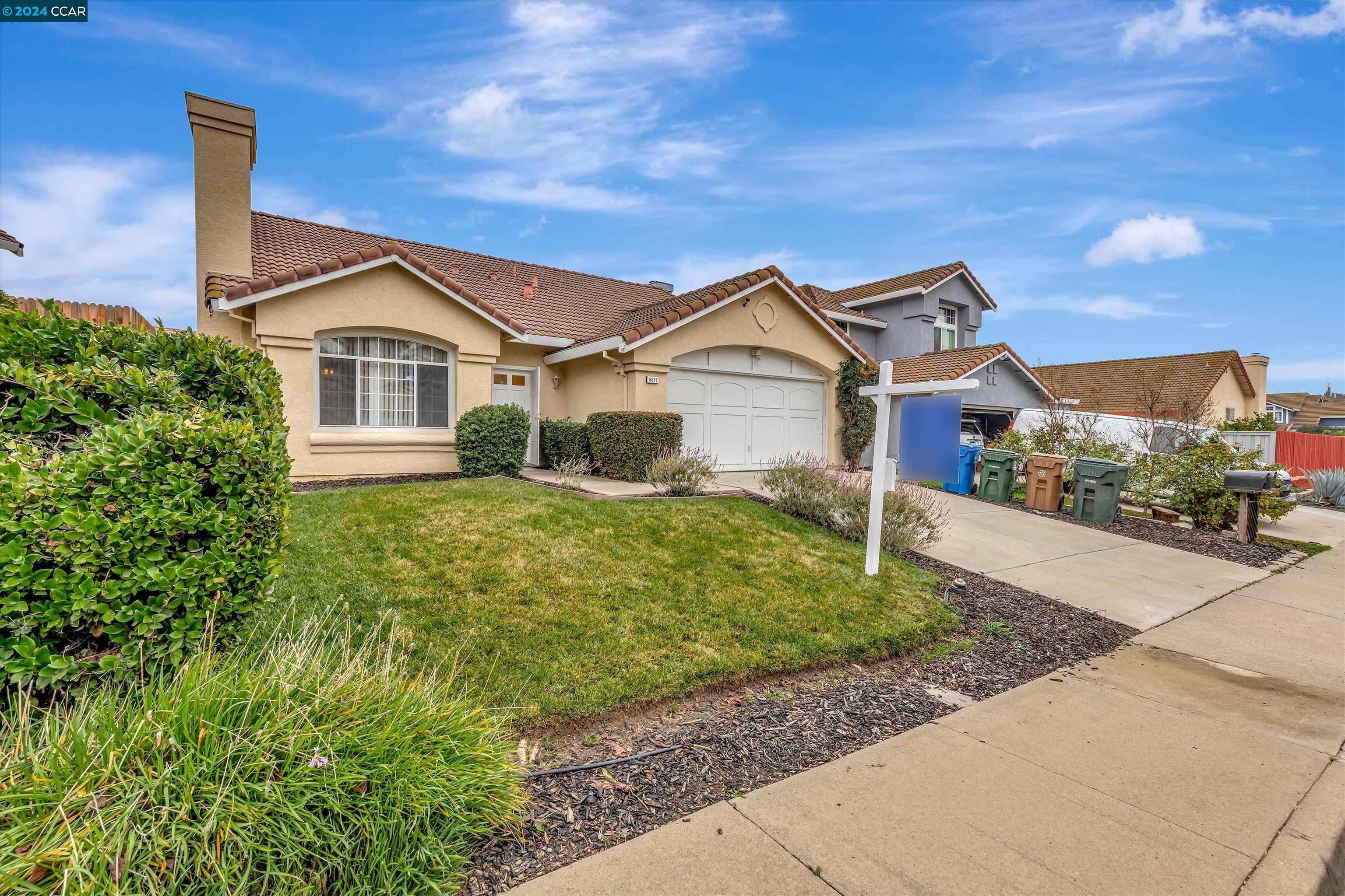 5027 Rodeo Circle Antioch, CA 94531 - Photo 1 of 1 a front view of a house with a garden