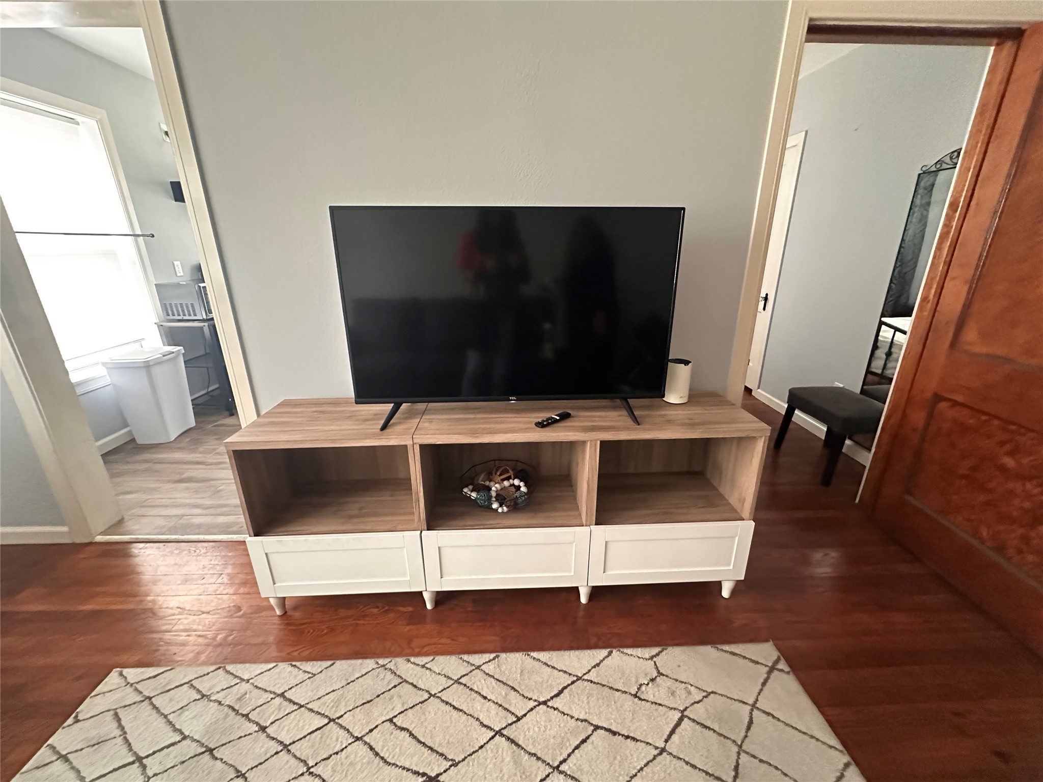 4302 Polk Street, Unit 8 Houston, TX 77023 - Photo 2 of 9 a view of living room with furniture and a flat screen tv