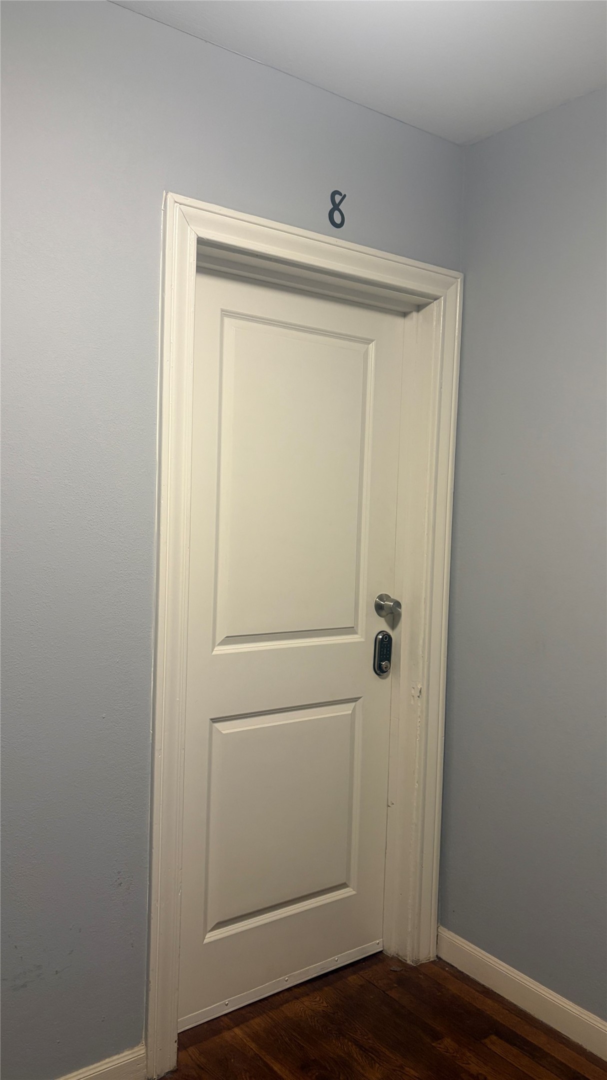 4302 Polk Street, Unit 8 Houston, TX 77023 - Photo 9 of 9 a view of door with wooden floor