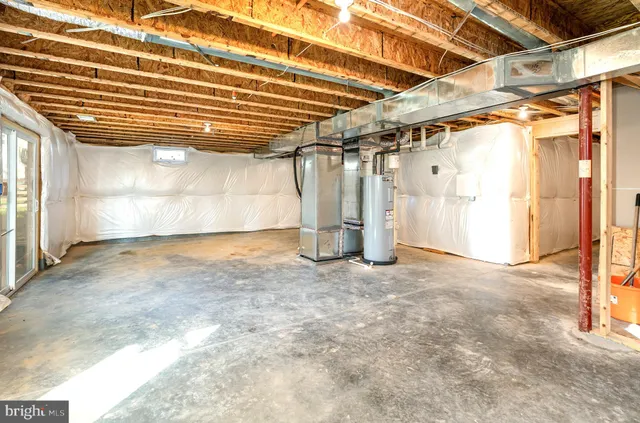 a view of a room with wooden walls