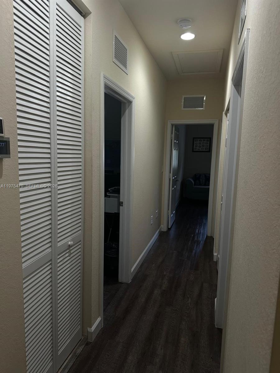 17135 Southwest 96th Street Miami, FL 33196 - Photo 9 of 36 a view of a hallway
