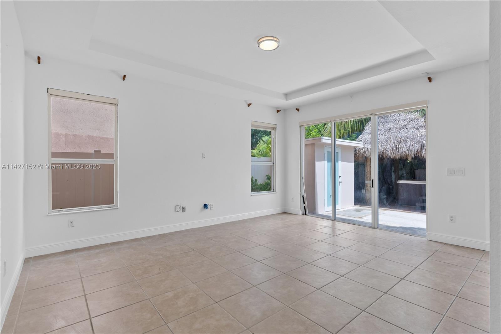 3759 Northeast 15th Street Homestead, FL 33033 - Photo 16 of 55 a view of an empty room with a window