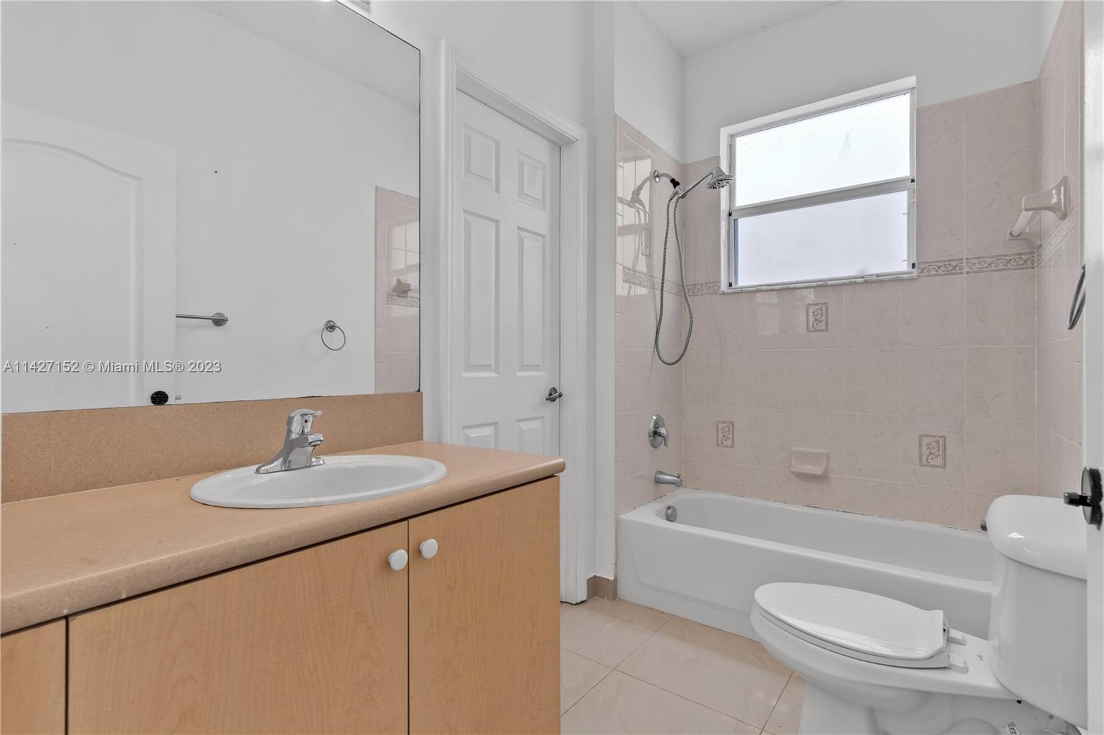 3759 Northeast 15th Street Homestead, FL 33033 - Photo 17 of 55 a bathroom with a granite countertop sink toilet and shower