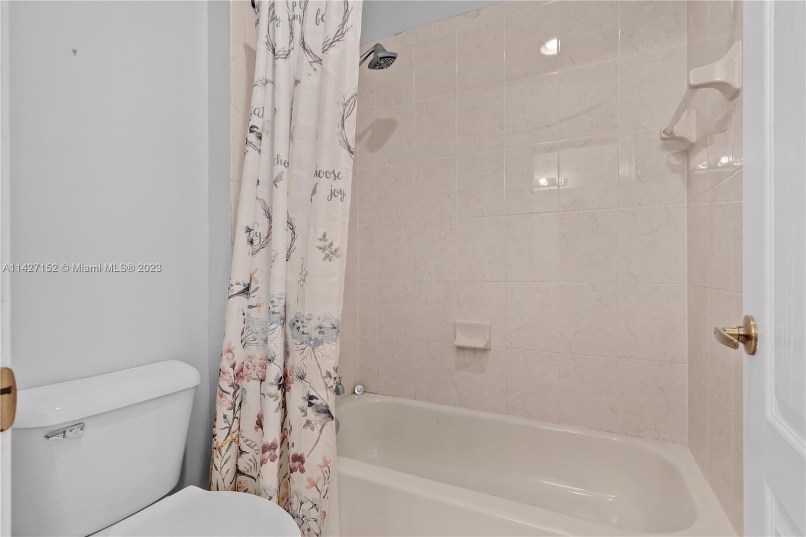 3759 Northeast 15th Street Homestead, FL 33033 - Photo 19 of 55 a bathroom with a bathtub and shower