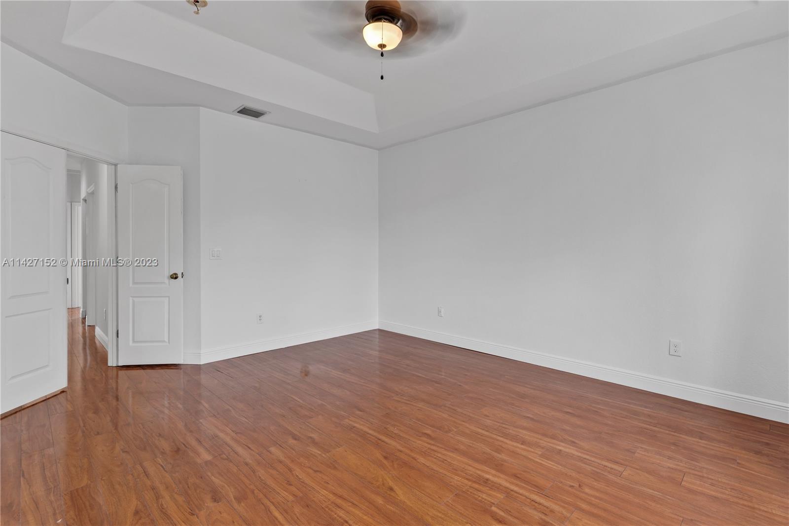 3759 Northeast 15th Street Homestead, FL 33033 - Photo 30 of 55 a view of an empty room with wooden floor
