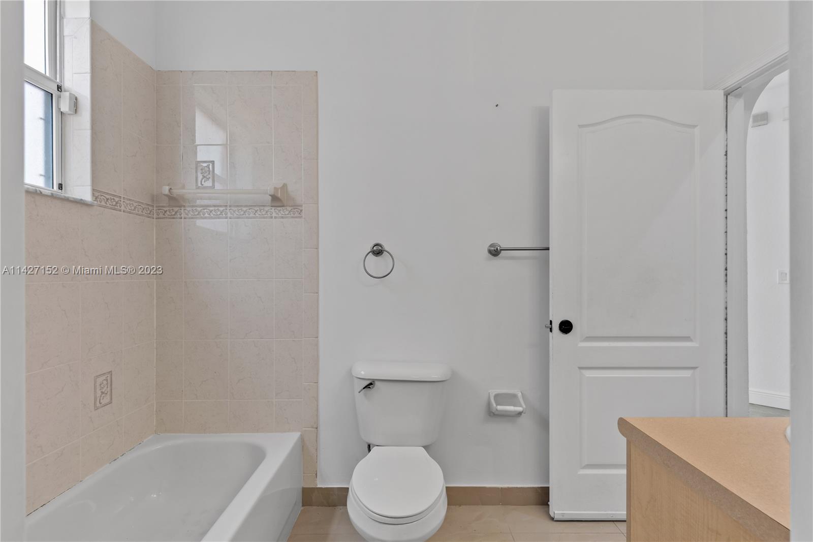 3759 Northeast 15th Street Homestead, FL 33033 - Photo 37 of 55 a bathroom with a sink a toilet and shower