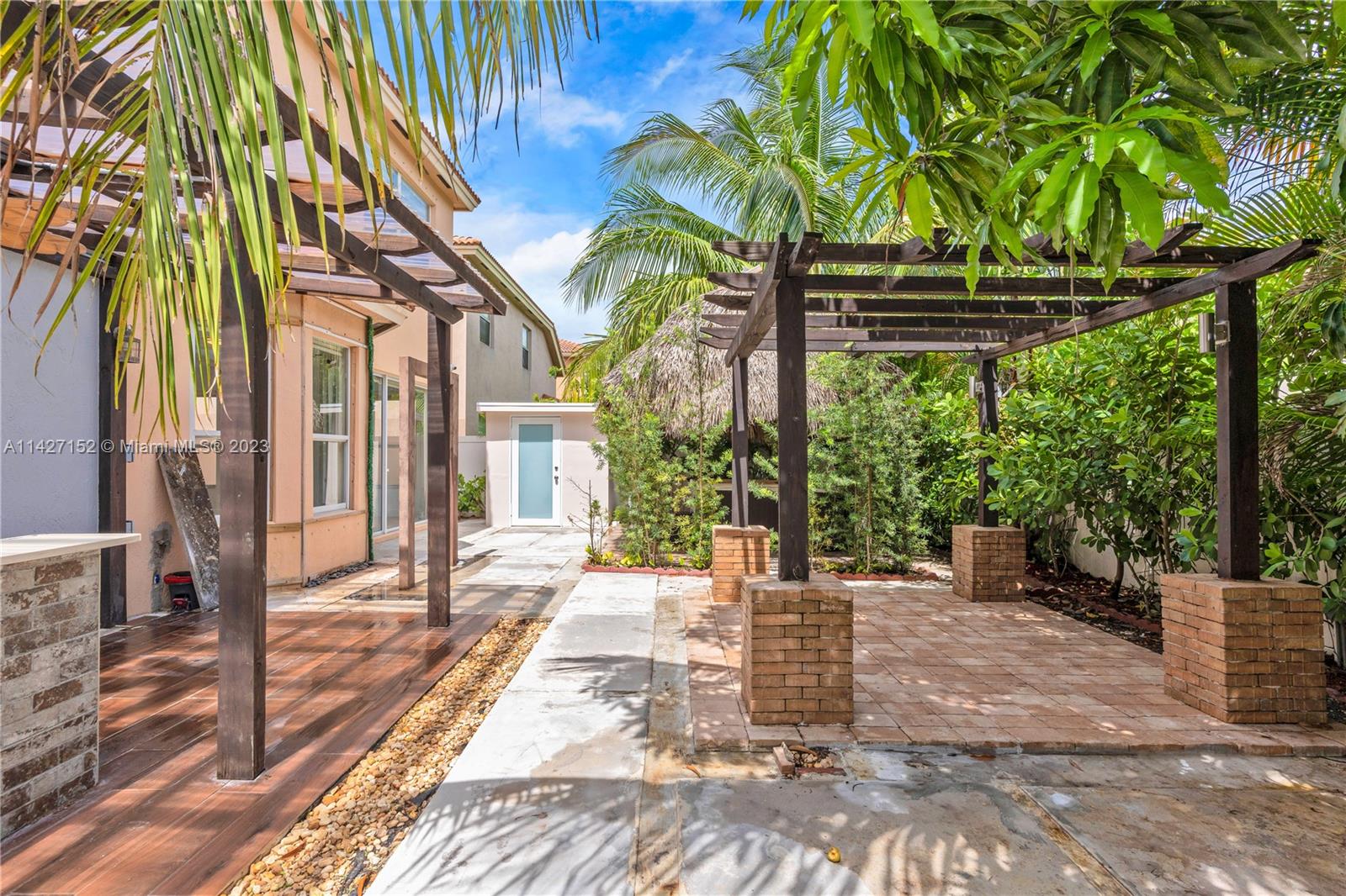 3759 Northeast 15th Street Homestead, FL 33033 - Photo 48 of 55 a view of a backyard with potted plants