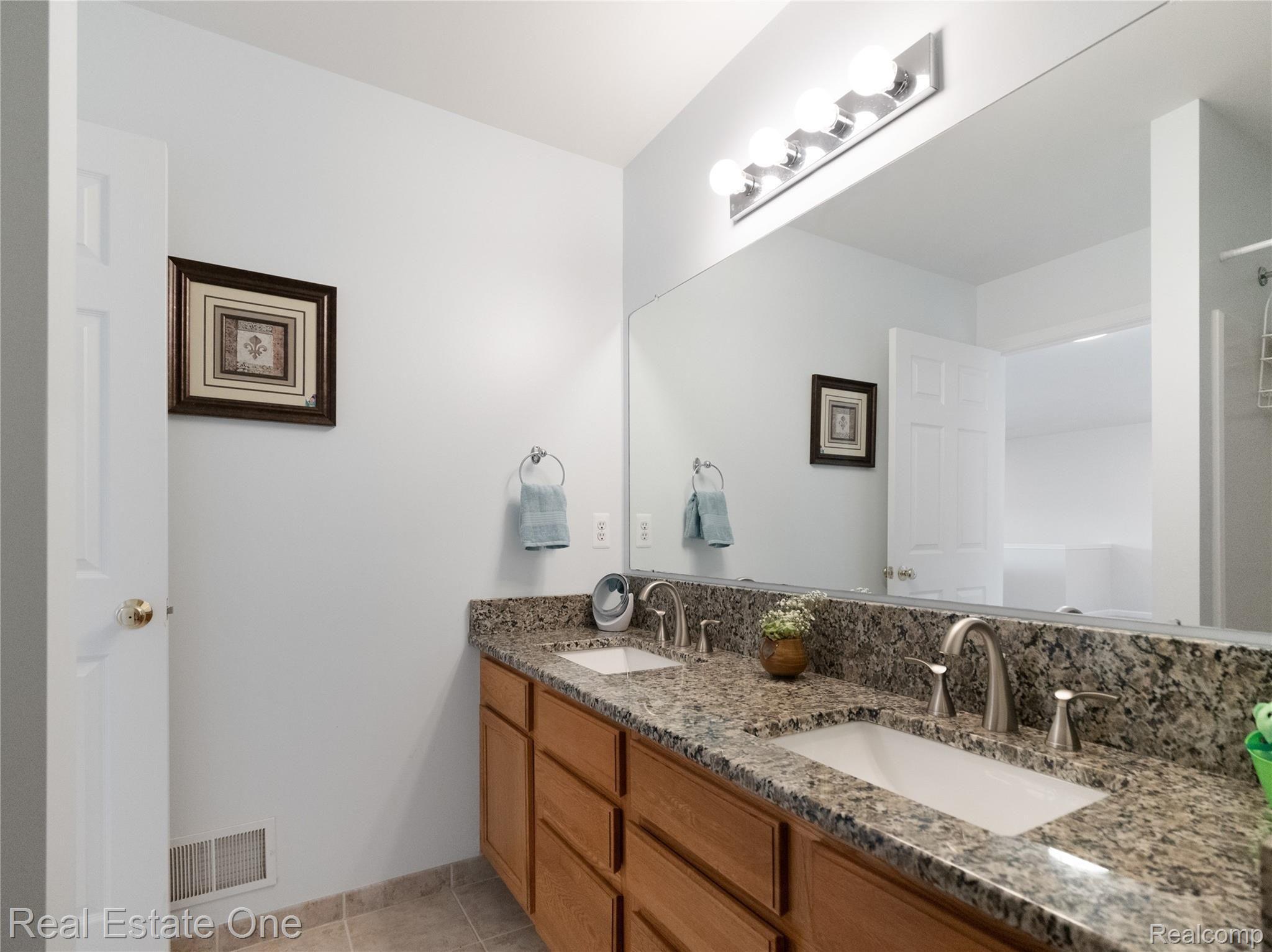 3597 Everett Drive Rochester, MI 48307 - Photo 29 of 57 2nd Floor Full Bath Features Dual Sinks and Plenty of Counter Space.jpg