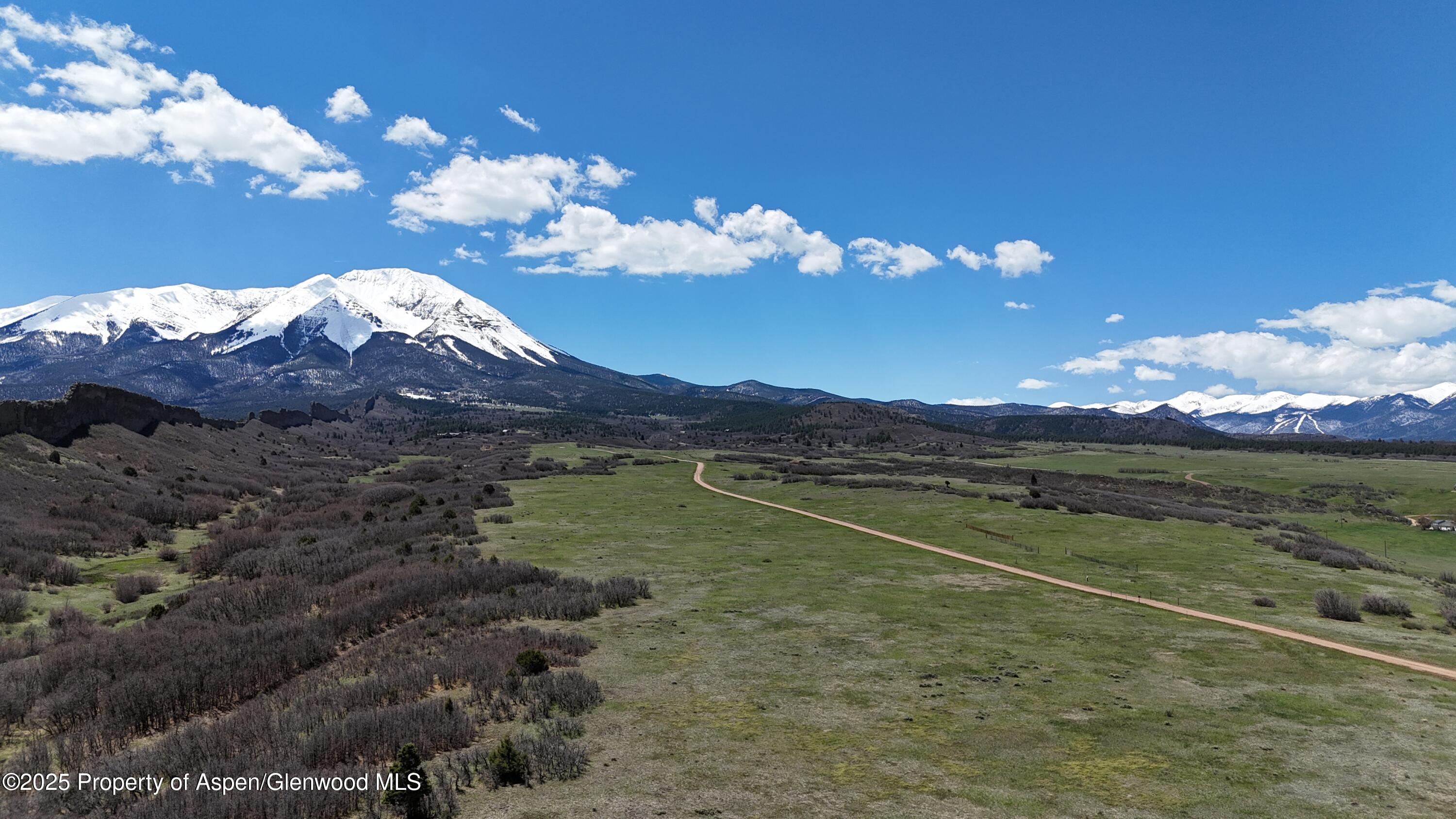 741 Big Wall Lane La Veta, CO 81055 - Photo 12 of 47 a view of a lake with sunset