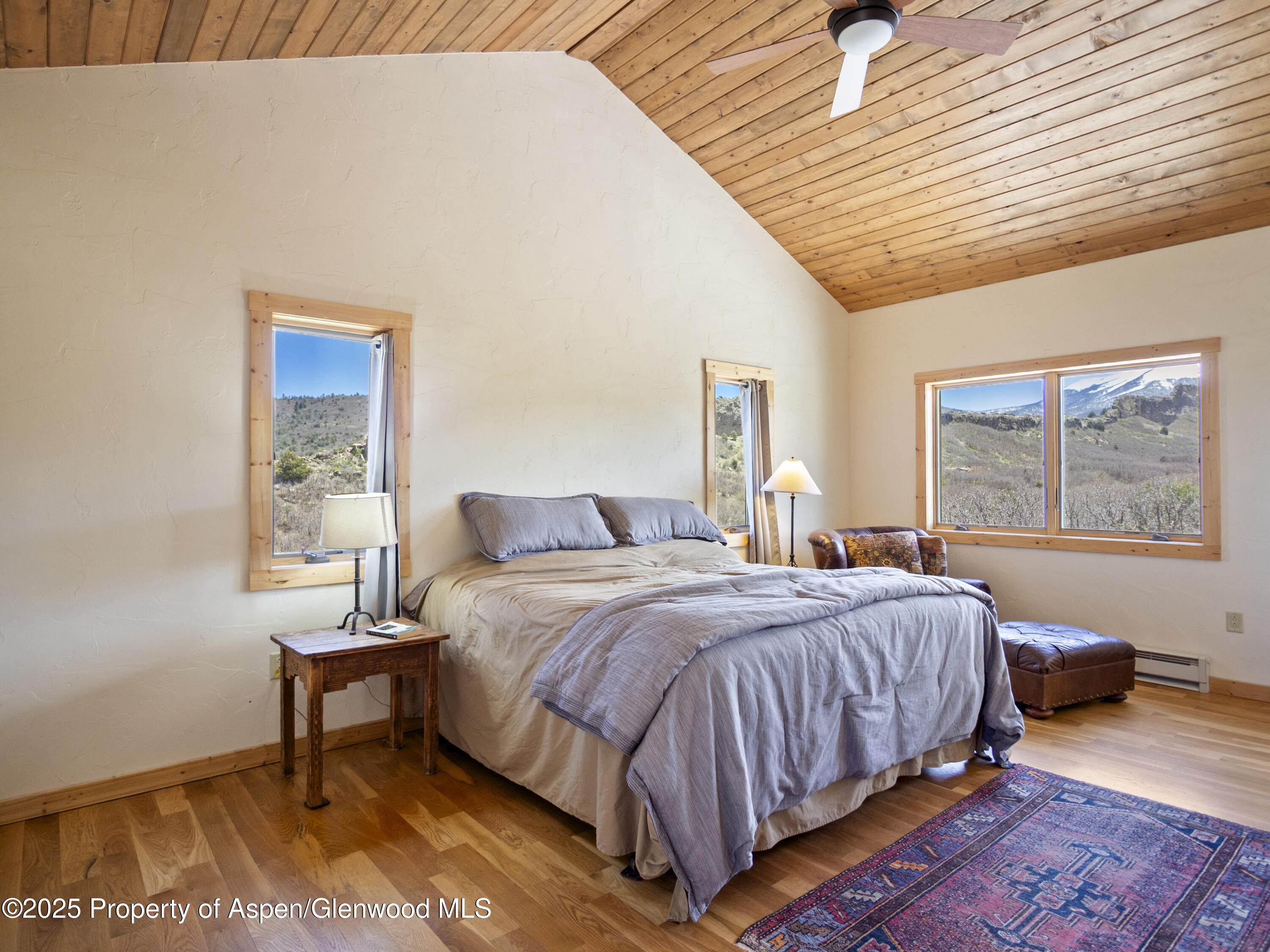 741 Big Wall Lane La Veta, CO 81055 - Photo 36 of 47 a bedroom with a bed and window