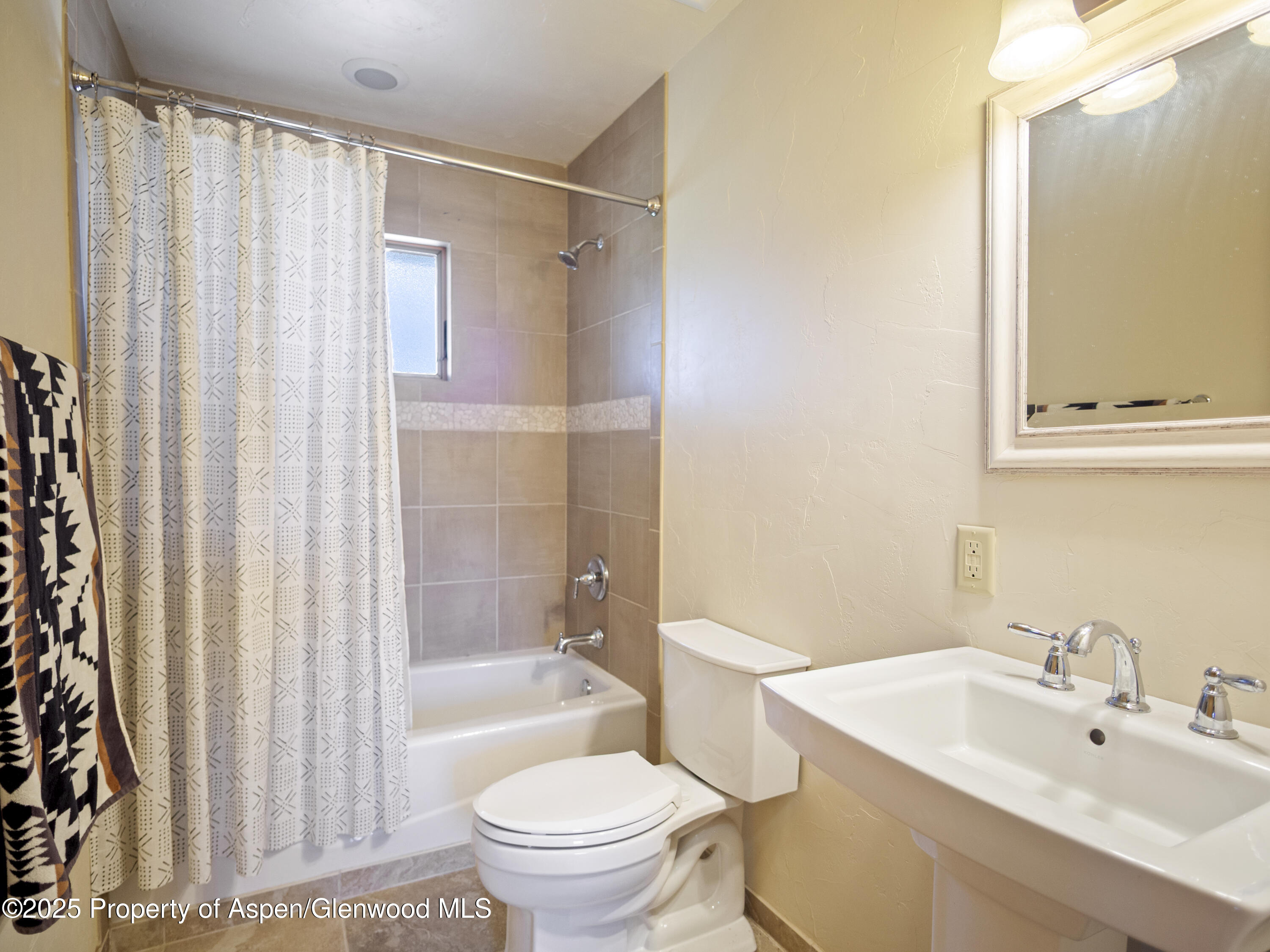 741 Big Wall Lane La Veta, CO 81055 - Photo 44 of 47 a bathroom with a sink toilet and shower