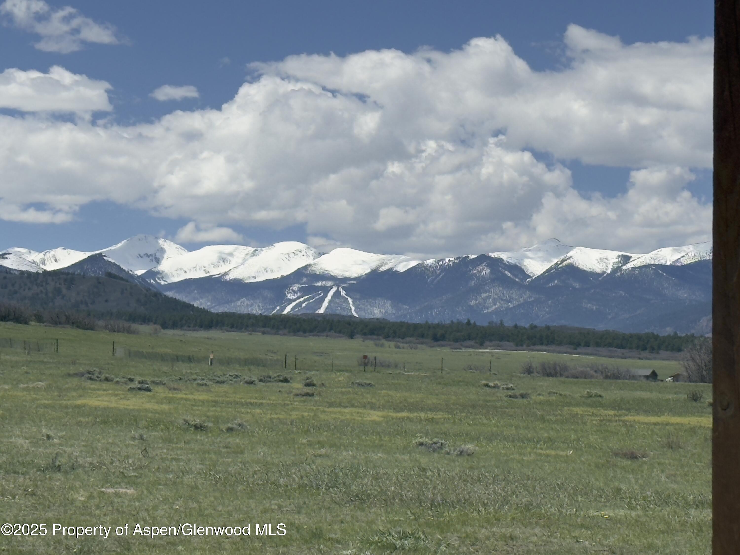 741 Big Wall Lane La Veta, CO 81055 - Photo 8 of 47 a view of a town with mountains in the background