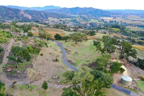 a view of a yard with mountain