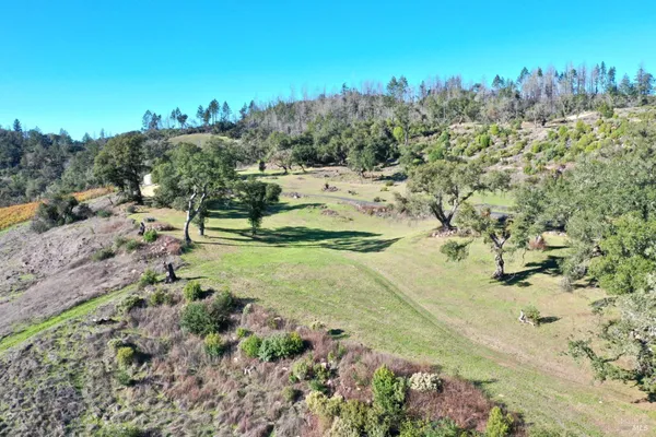 a view of a lake with mountains in the background