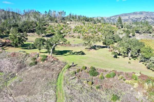 a view of a city with mountains in the background