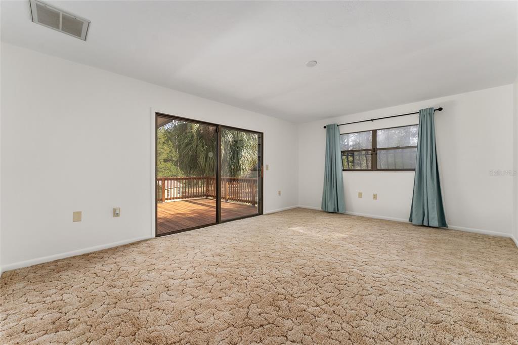 20290 Southwest 97th Place Dunnellon, FL 34431 - Photo 19 of 73 a view of an empty room with a window