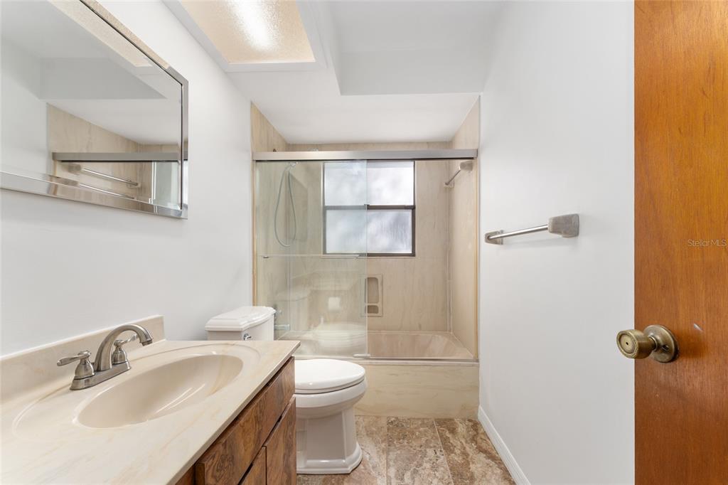 20290 Southwest 97th Place Dunnellon, FL 34431 - Photo 27 of 73 a bathroom with a sink toilet and shower